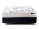 White mattress with a blue brand label on a white background