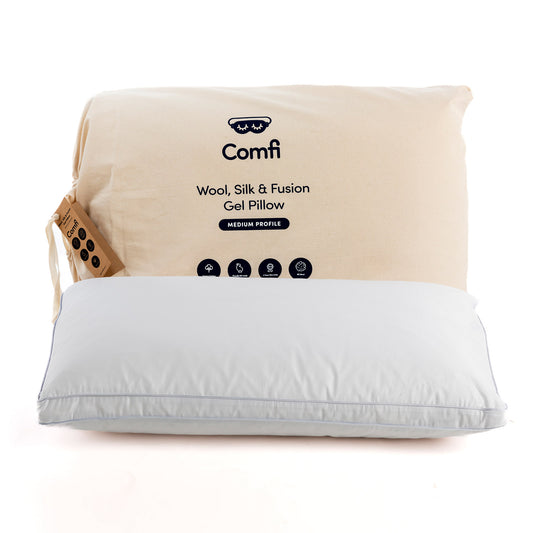 White pillow with beige packaging labeled 'Comfi' on a white background